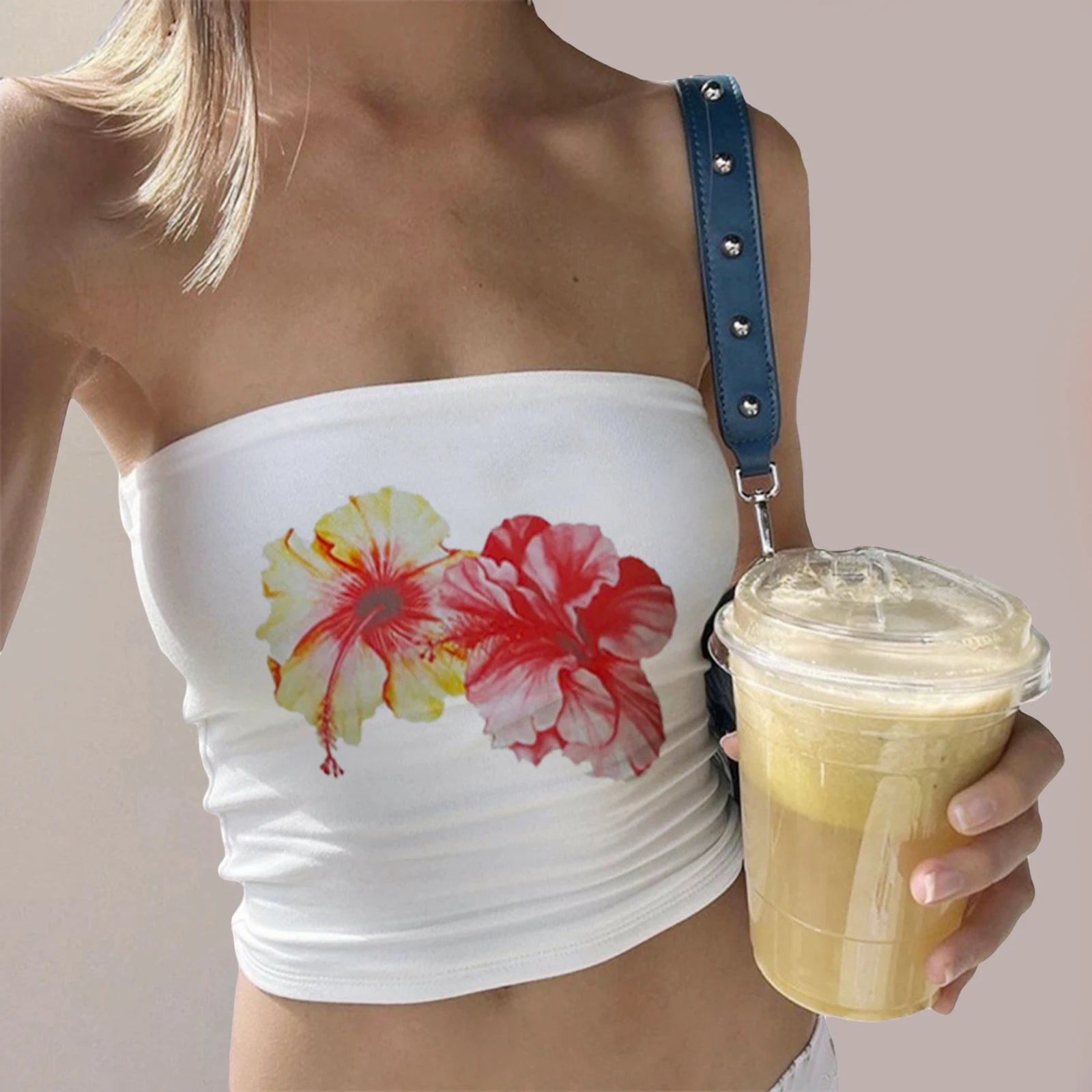 Women's white tube top with floral print, perfect for summer outings