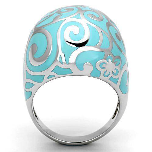 Stunning turquoise inlay cocktail ring with intricate silver swirl design for a stylish touch