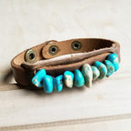 Handmade turquoise stone cuff bracelet with natural stones on a brown leather band