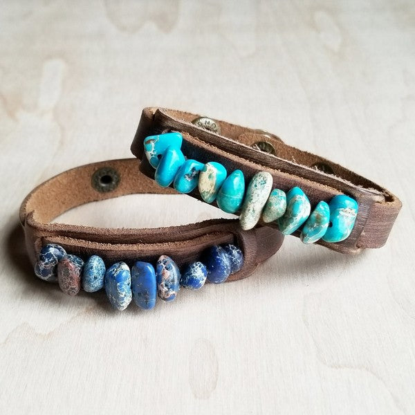 Handcrafted turquoise stone cuff bracelet featuring assorted turquoise stones on a leather band