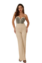 Elegant twisted rope knot jumpsuit with a strapless beaded top and wide-leg pants perfect for special occasions