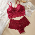 Red lace two-piece underwear set for travel with delicate floral design