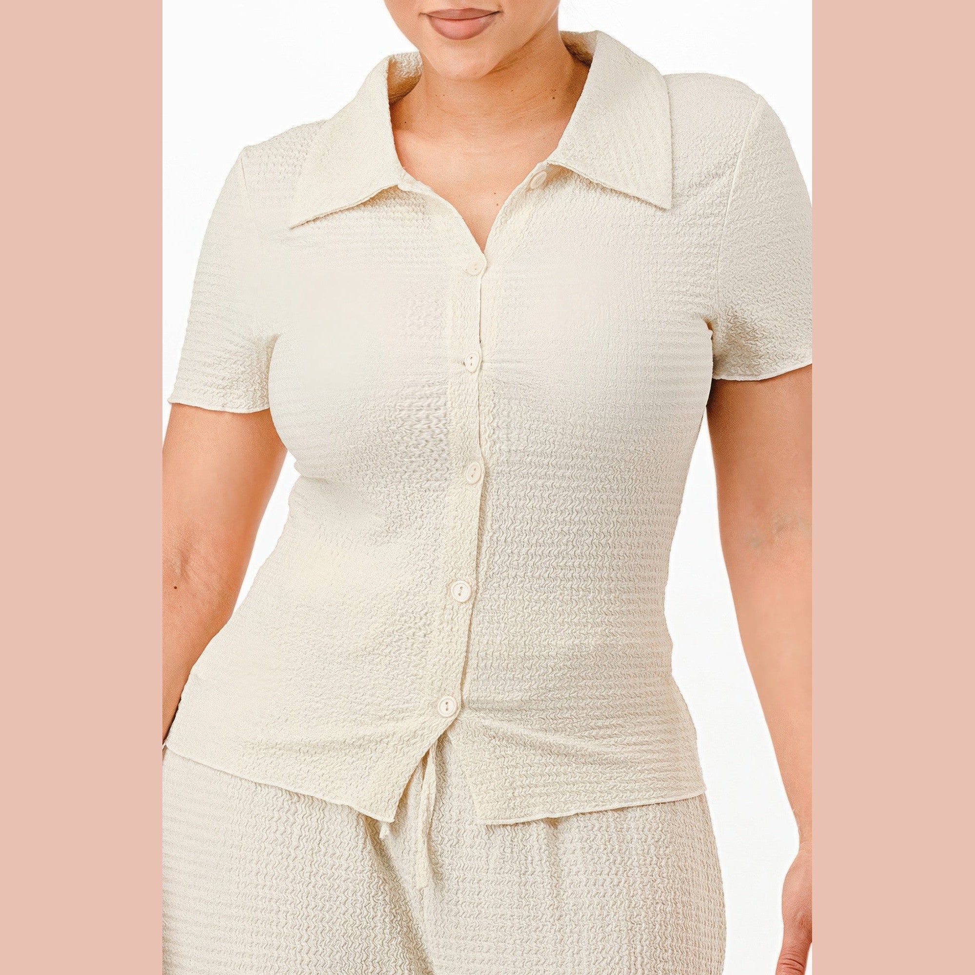Cream textured two piece lounge set for travel with short sleeves and button-up top by VacationGrabs