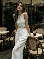 Women's white two piece set with lace top, perfect for casual outings