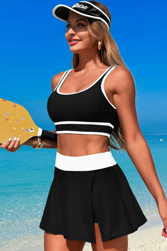 Women's black two piece swimsuit with sporty design for beach activities