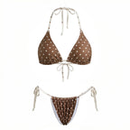 Brown polka dot two piece swimsuit, perfect for beach outings