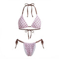 Women's polka dot two piece swimsuit, pink and brown, ideal for beach fun