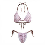 Women's polka dot two piece swimsuit, pink and brown, ideal for beach fun