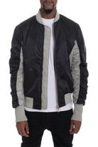 VacationGrabs two tone bomber for men with contrasting black and gray panels and a stylish design