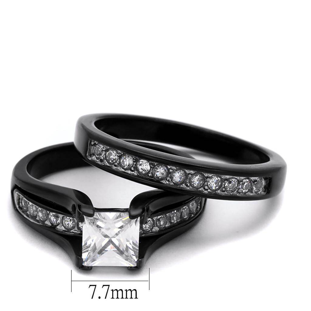 Black two-tone cubic zirconia engagement ring with a princess-cut center stone and sparkling band.