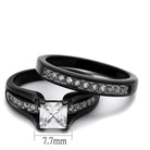 Black two-tone cubic zirconia engagement ring with a princess-cut center stone and sparkling band.