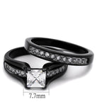 Black two-tone cubic zirconia engagement ring with a princess-cut center stone and sparkling band.