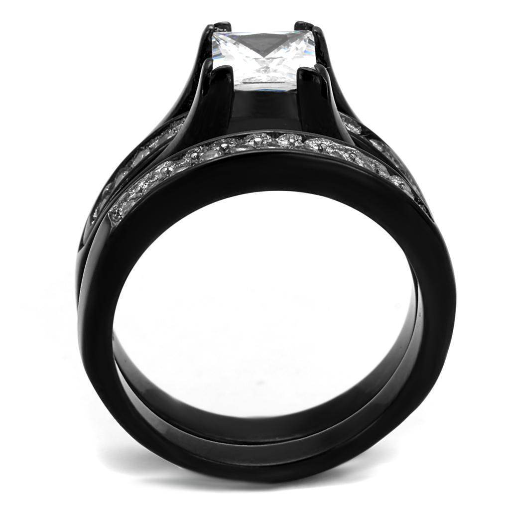 Elegant two-tone cubic zirconia engagement ring with a princess cut center stone and intricate band design
