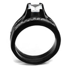 Elegant two-tone cubic zirconia engagement ring with a princess cut center stone and intricate band design