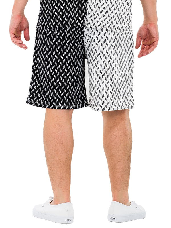 WEIV two tone summer shorts for men in black and white pattern worn with white sneakers