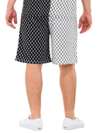 WEIV two tone summer shorts for men in black and white pattern worn with white sneakers