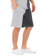 WEIV two tone summer shorts for men in black and white pattern paired with white sneakers
