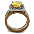 Two tone womens ring featuring a large yellow stone with diamond accents for a stunning look