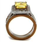 Two tone womens ring featuring a large yellow stone with diamond accents for a stunning look