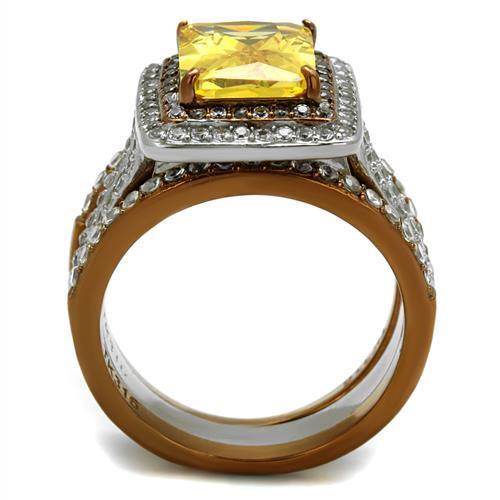 Two tone womens ring featuring a large yellow stone with diamond accents for a stunning look