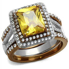 Stunning two tone womens ring featuring a large yellow gemstone surrounded by sparkling stones