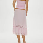 Pink under dress half slip with lace trim, perfect for layering