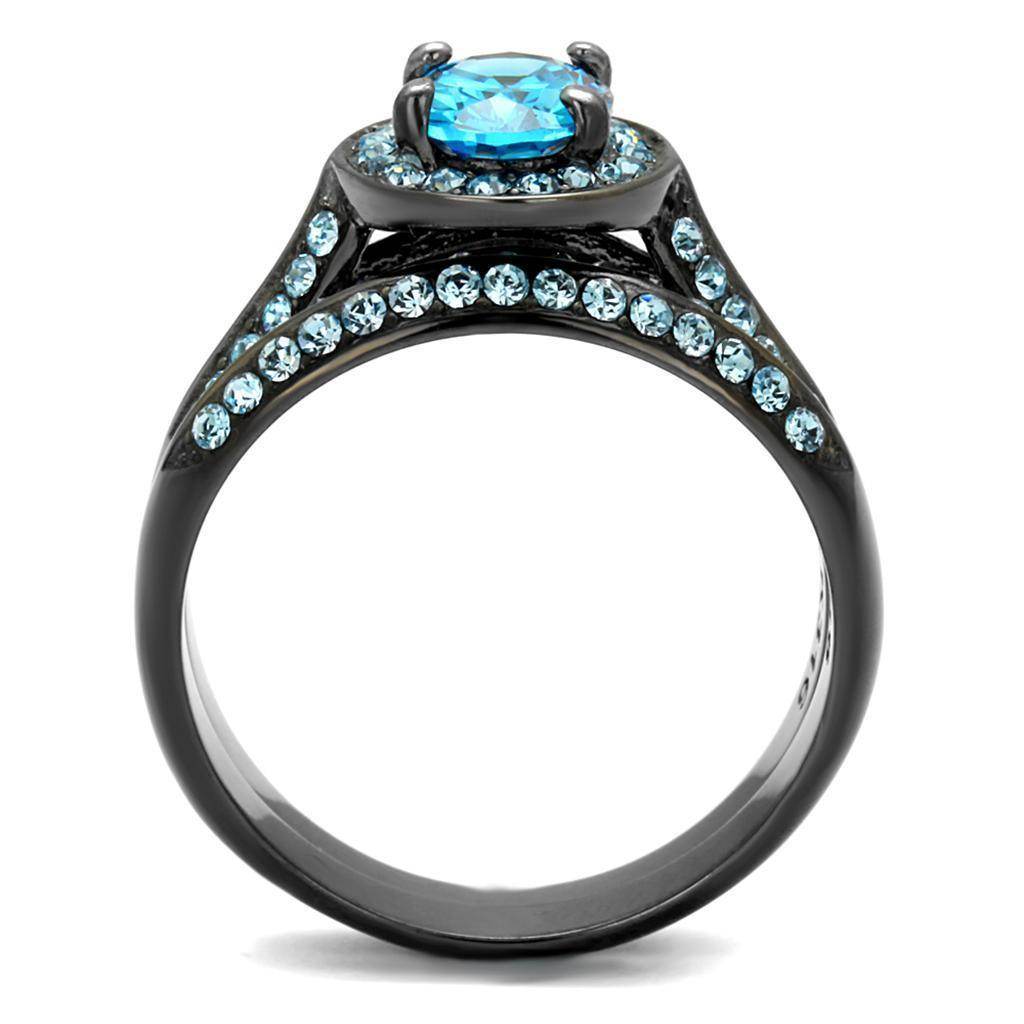 Unique black engagement ring featuring a blue center stone and sparkling accents for a stunning look