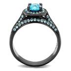 Unique black engagement ring featuring a blue center stone and sparkling accents for a stunning look