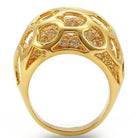 Elegant unique gold statement ring featuring intricate cutouts and sparkling details