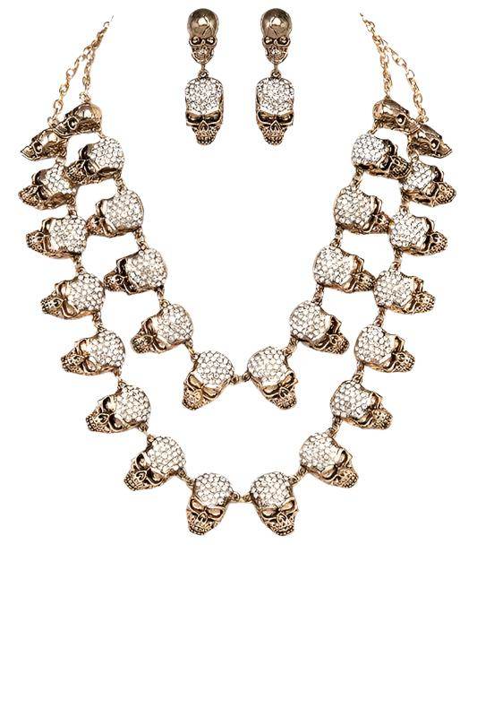 Unique gothic skull jewelry set featuring a necklace and matching earrings with sparkling details