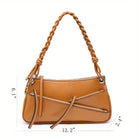 Unique handmade small shoulder bag in tan with braided handle and multiple compartments