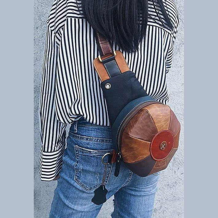 Unique leather handbag women with a stylish round design, perfect for casual outings and trendsetters.