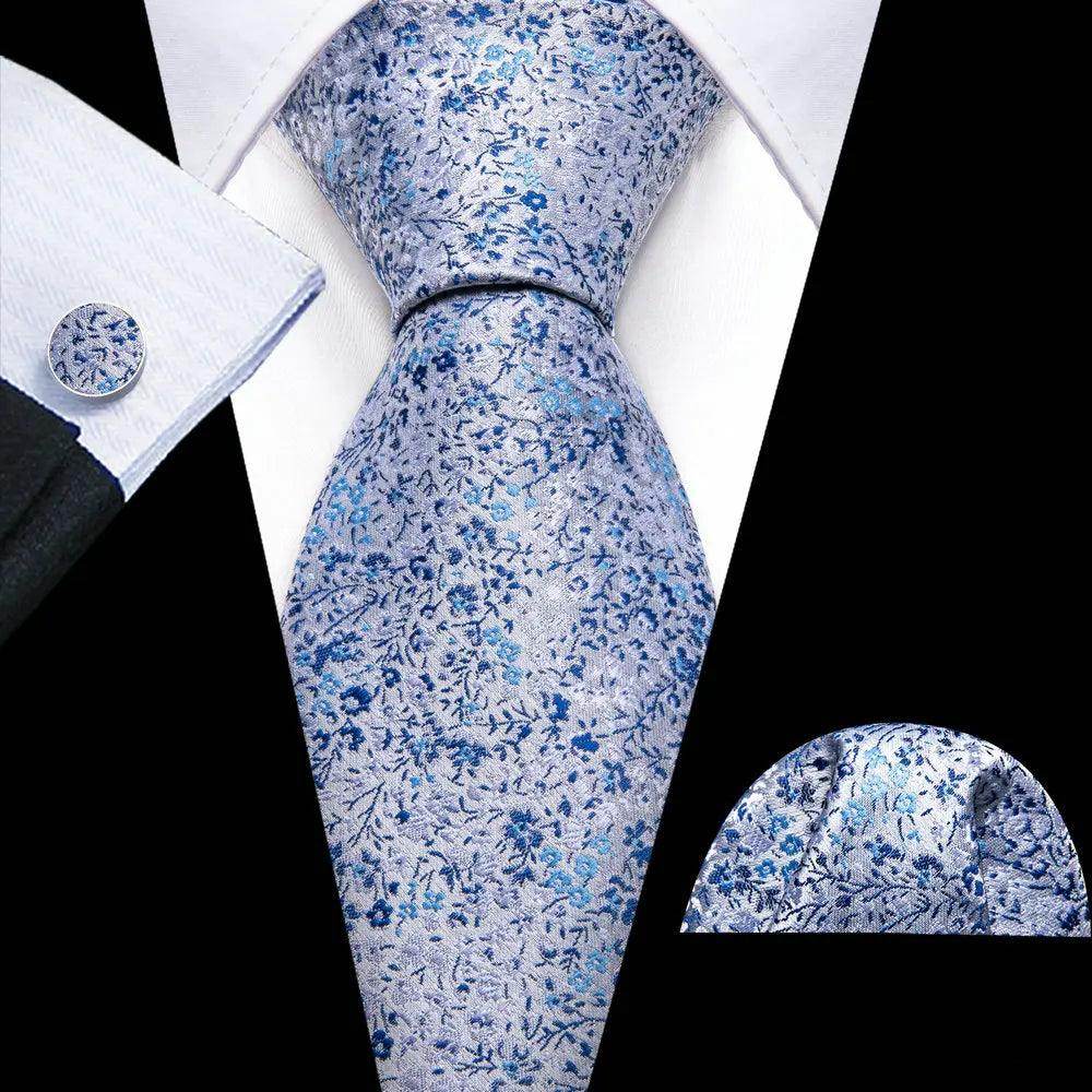 VacationGrabs unique necktie designs featuring a floral pattern in blue with matching pocket square