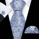 VacationGrabs unique necktie designs featuring a floral pattern in blue with matching pocket square