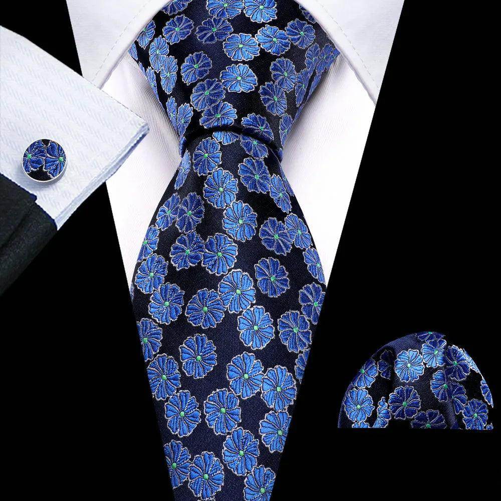 VacationGrabs unique necktie designs featuring blue floral patterns on a dark background