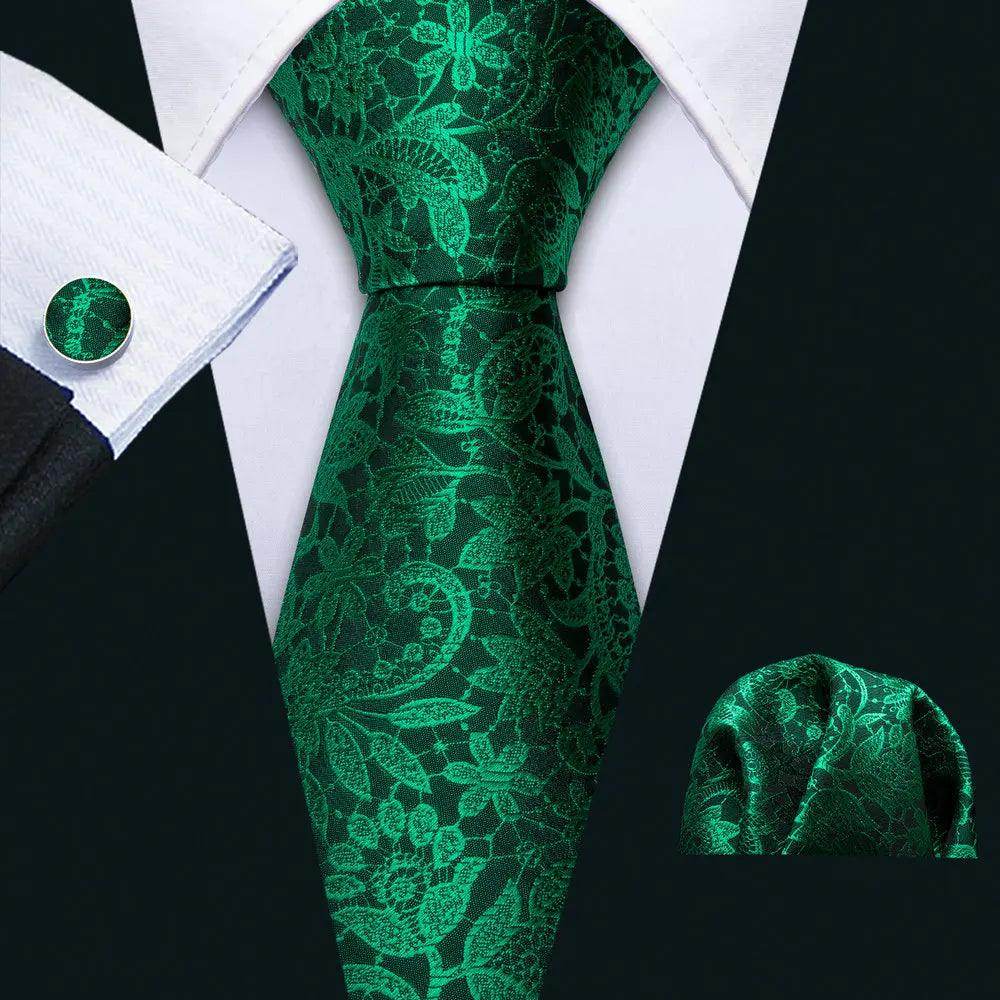 Stylish green tie with intricate floral patterns, showcasing unique necktie designs for men's accessories