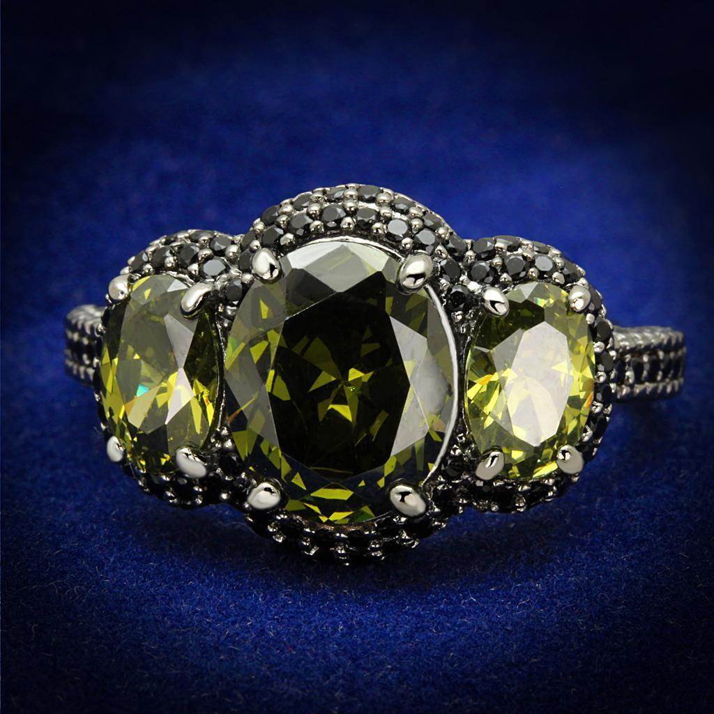 Stunning three-stone ring featuring green gemstones, a perfect unique vacation jewelry for women