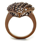 Unique vacation jewelry for women. Brown decorative ring with intricate design and shimmering details