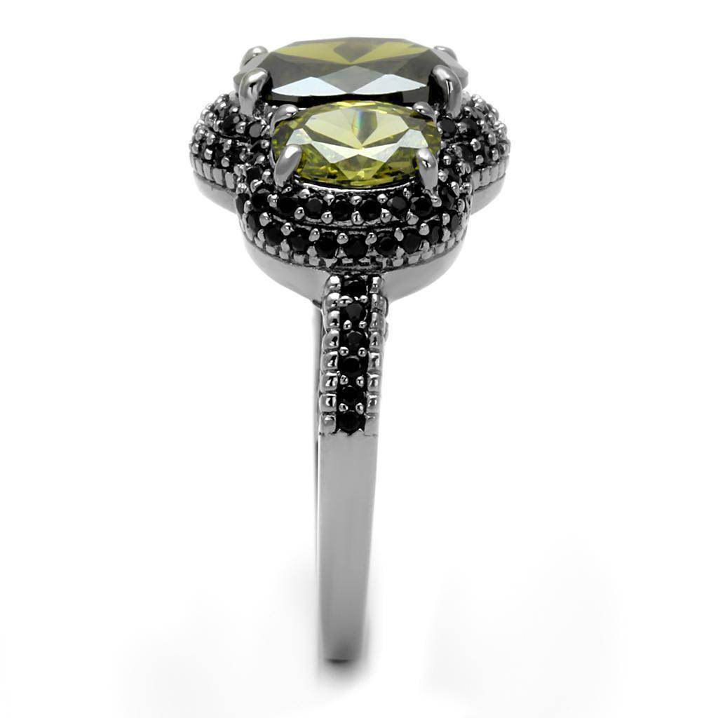 Unique vacation jewelry for women featuring a two-stone ring with green gemstones and intricate detailing