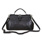 Black leather unisex shoulder bag for travel with adjustable strap and top handle