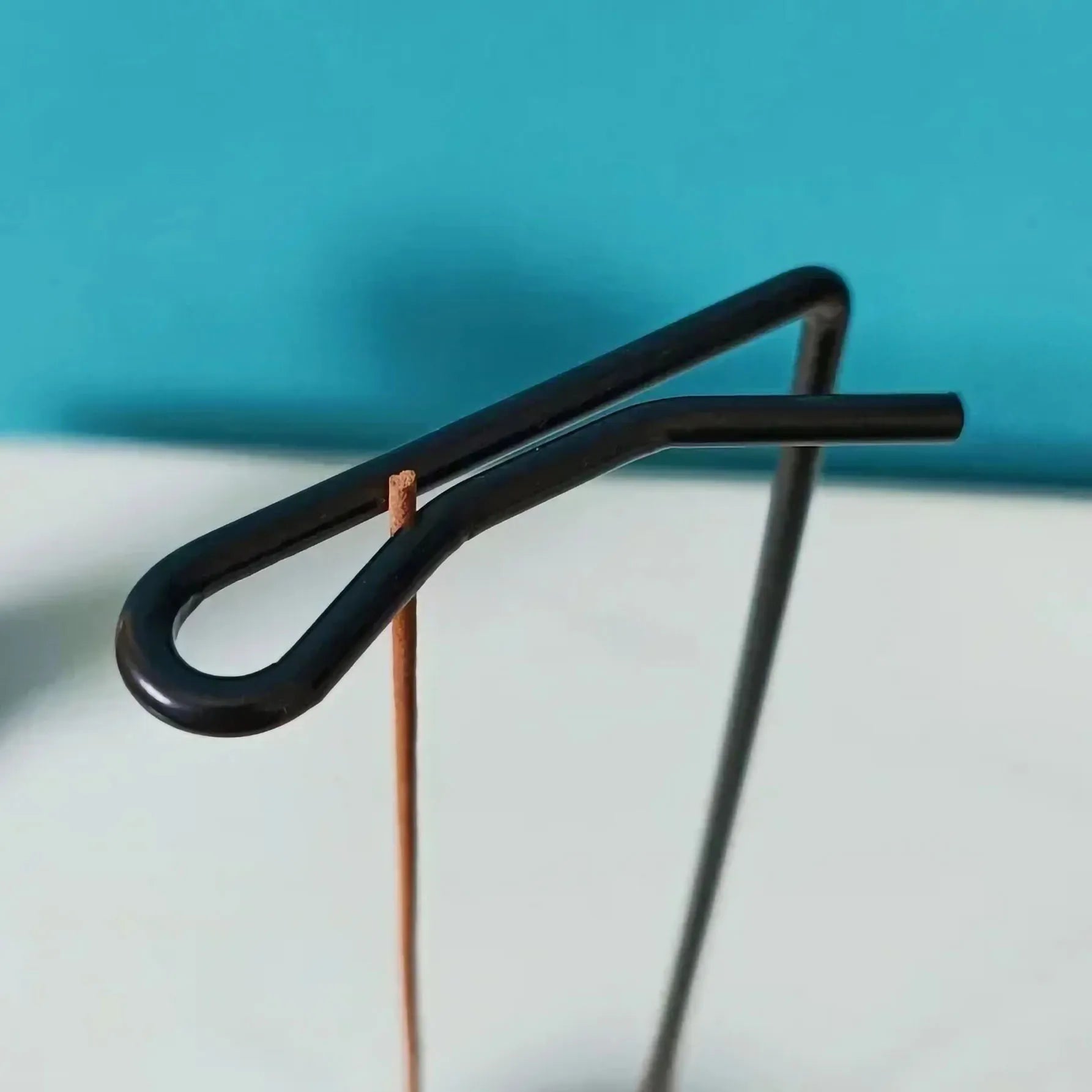 Black metal upside down incense burner for aromatic relaxation