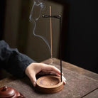 Decorative upside down incense burner in natural wood for calming ambiance