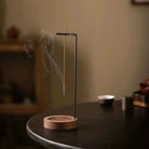Wooden base metal upside down incense burner for aromatic relaxation