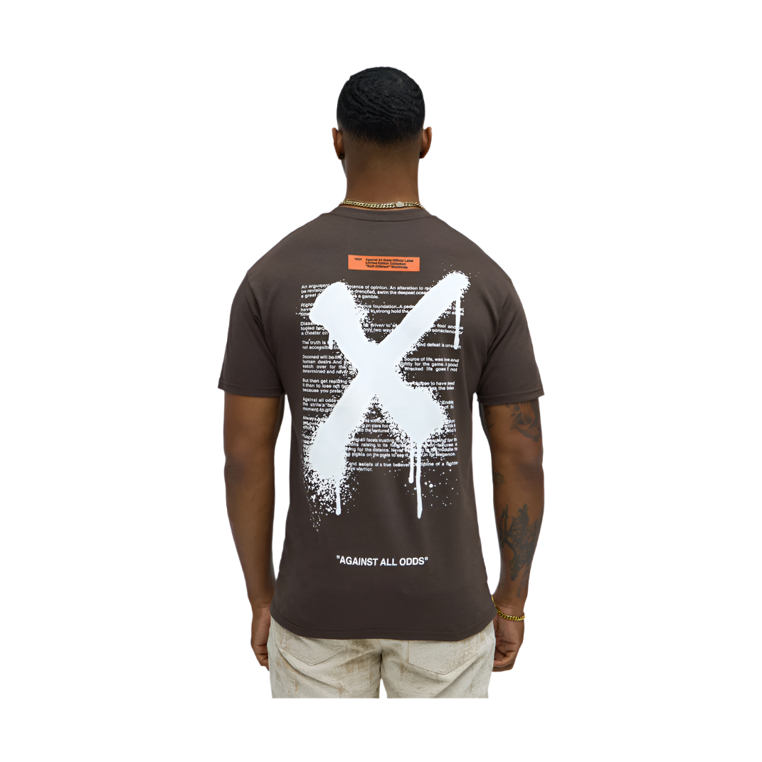Brown graffiti t shirt men by VacationGrabs featuring large white X print and text on back