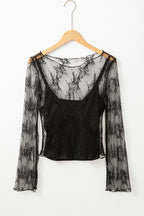 YNIQUE black lace mesh long sleeve blouse with sheer floral pattern and camisole lining on wooden hanger