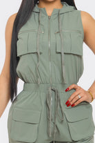 Stylish utility jumpsuit for travel with a hood and multiple front pockets