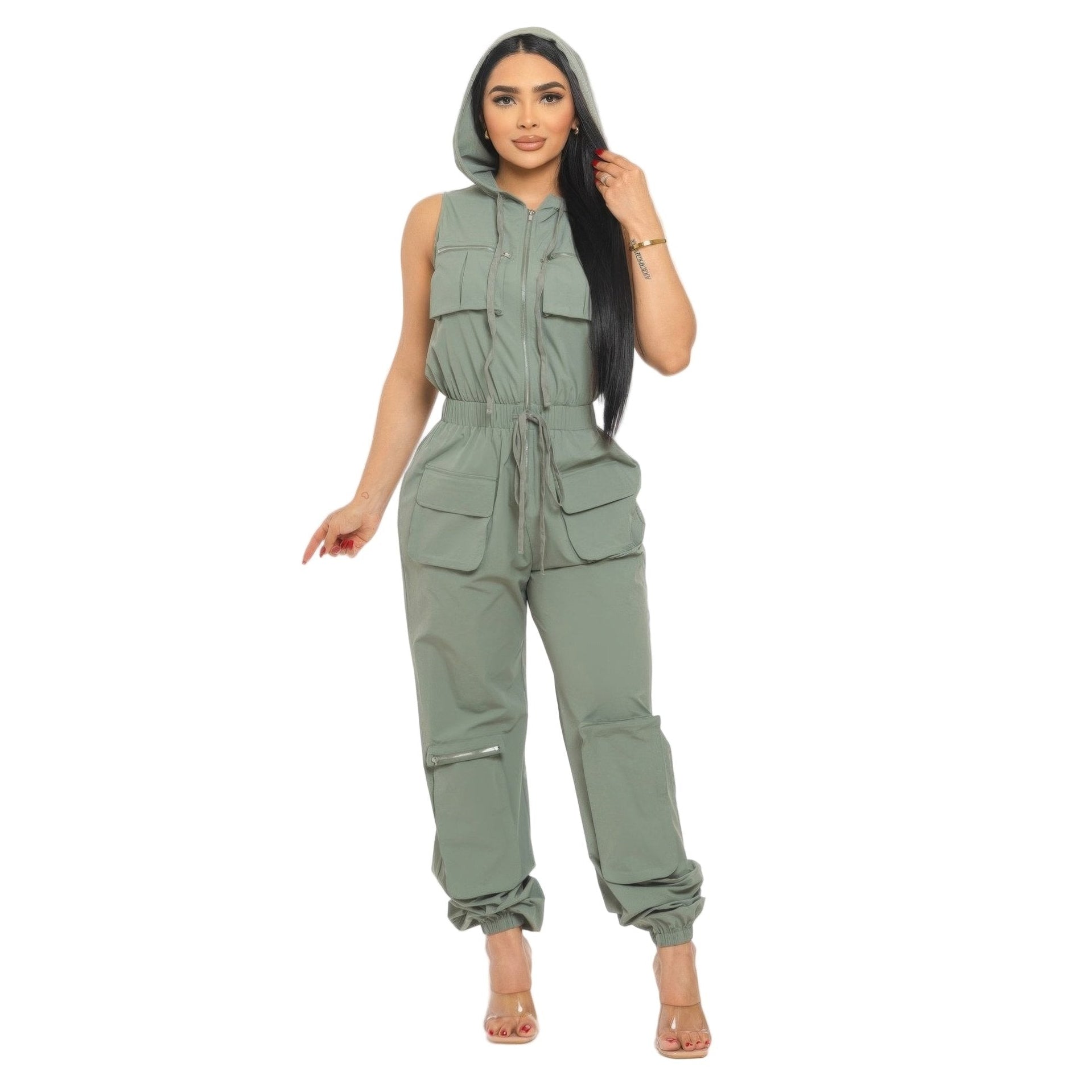 Comfortable women's utility jumpsuit for travel with a hood and multiple pockets in olive green