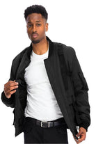 WEIV utility strap jacket for men in black with functional pockets and a sleek design