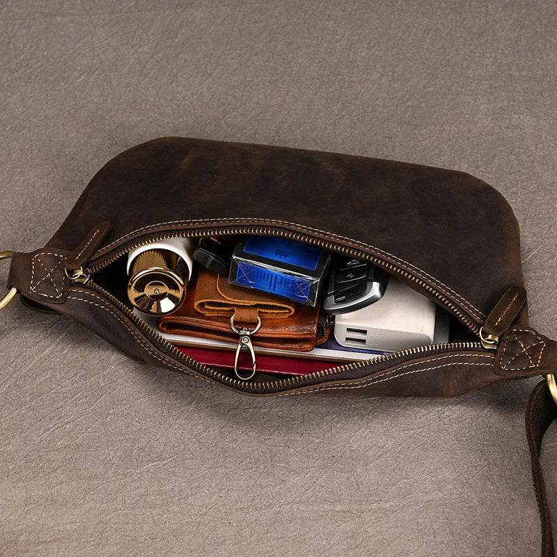 Vacation anti-theft bag in brown leather with spacious interior holding essential items