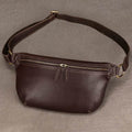 Vacation anti-theft bag in brown leather with adjustable strap and multiple zippered pockets for security